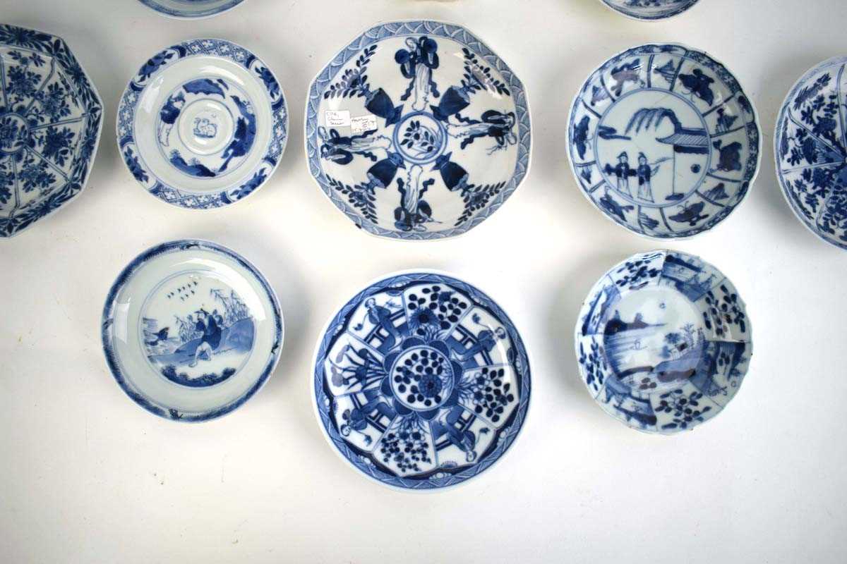 Eleven 18th century and later Chinese blue and white dishes and saucers including examples decorated - Image 4 of 8