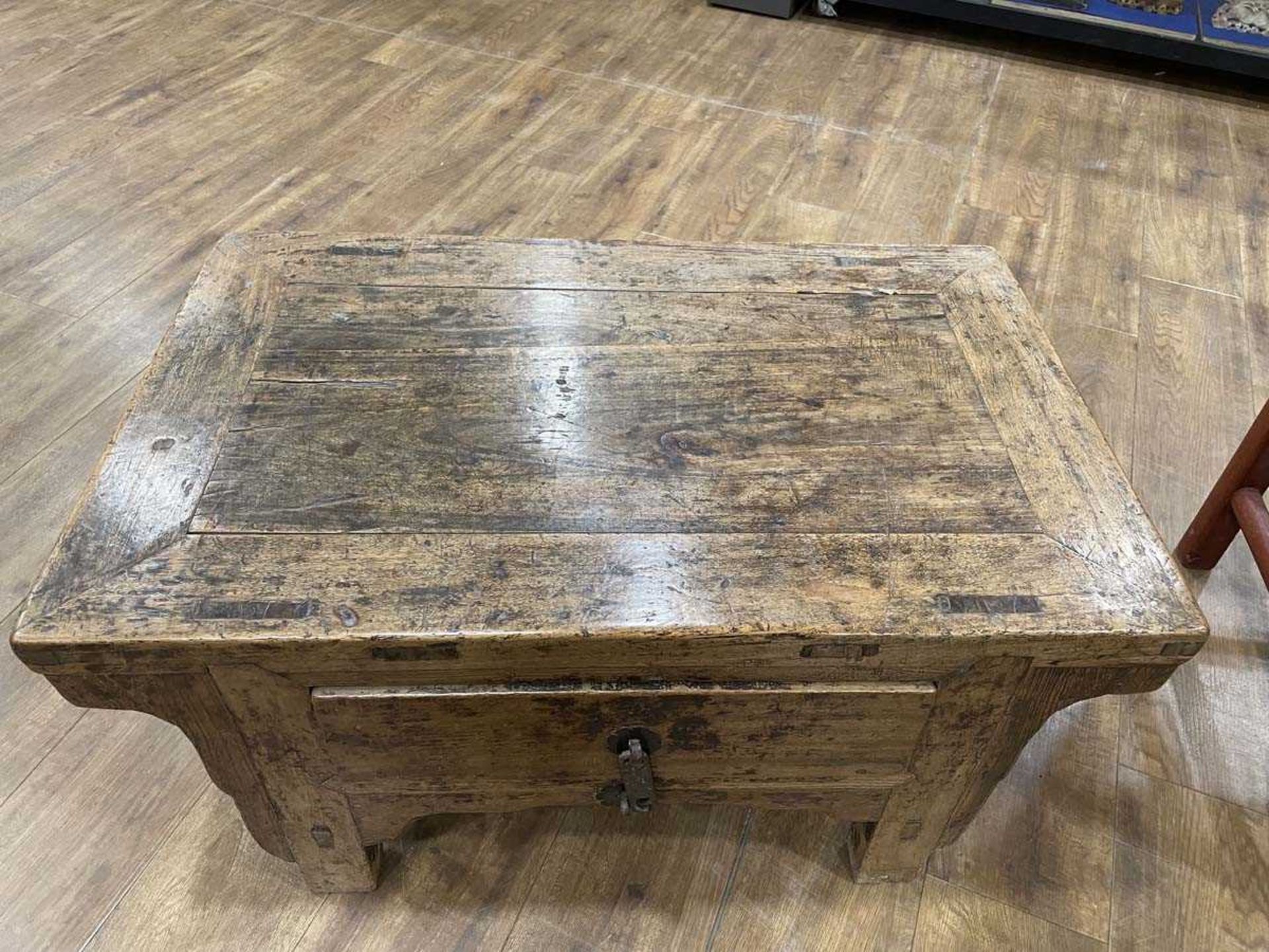 A Chinese low elm side table, the surface over a frieze on four shaped legs, 64 x 35 x 31 cm, - Bild 9 aus 15