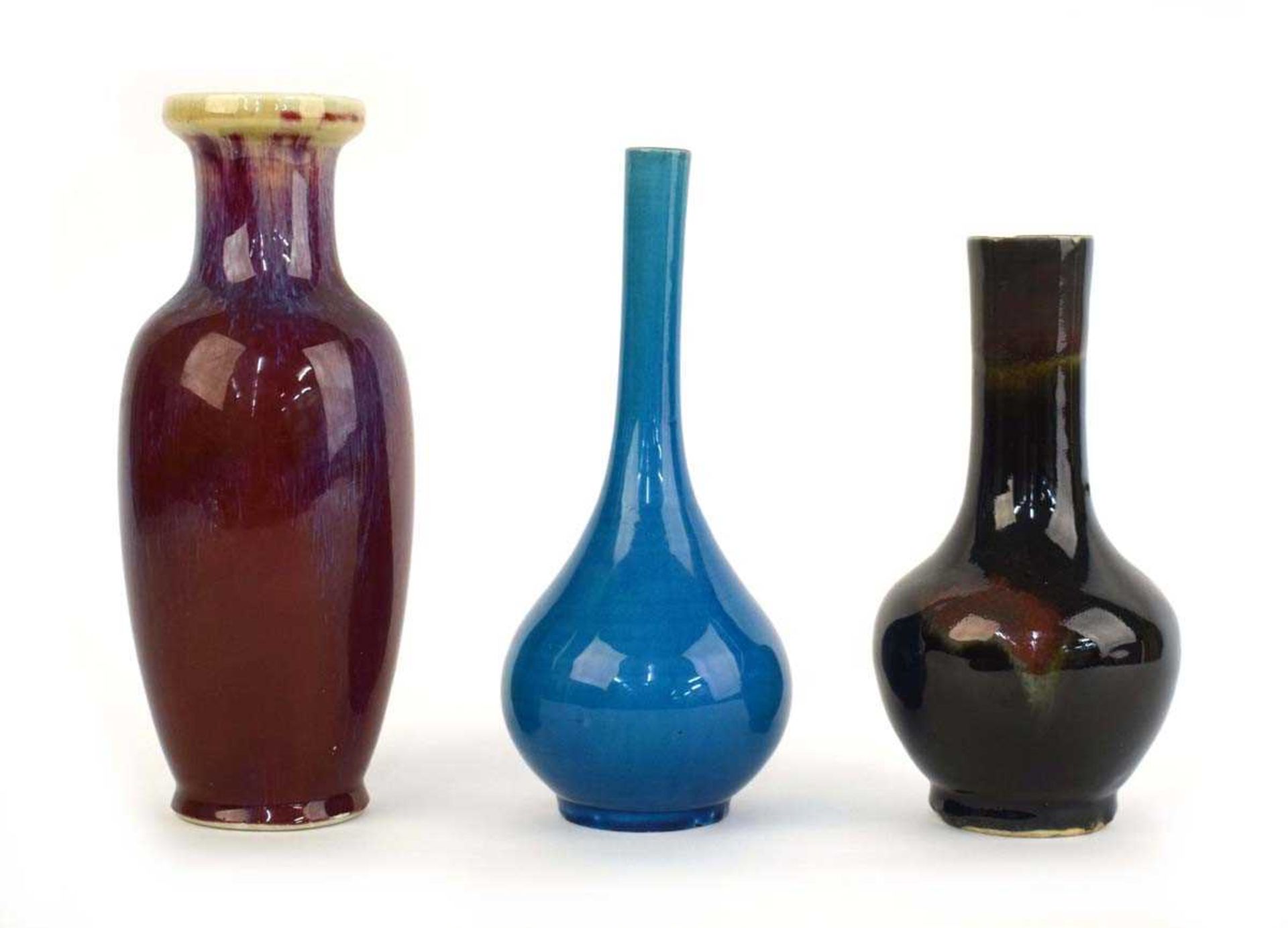 A Chinese kingfisher blue glazed bottle vase, h. 23.5 cm, d. 5cm, together with five further