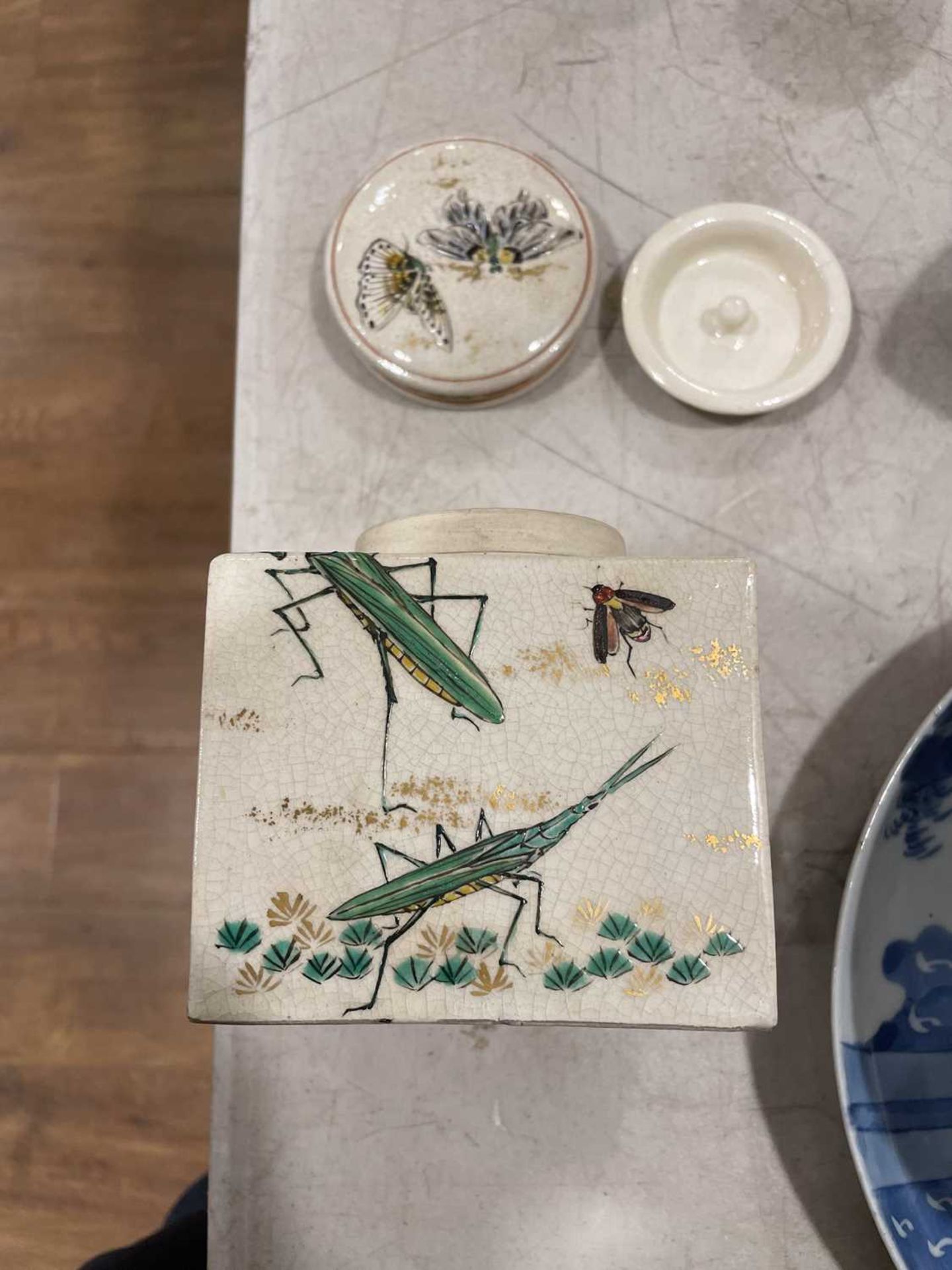 A Japanese satsuma bowl of flowerhead form, centrally decorated with peacocks within a landscape, - Image 39 of 41