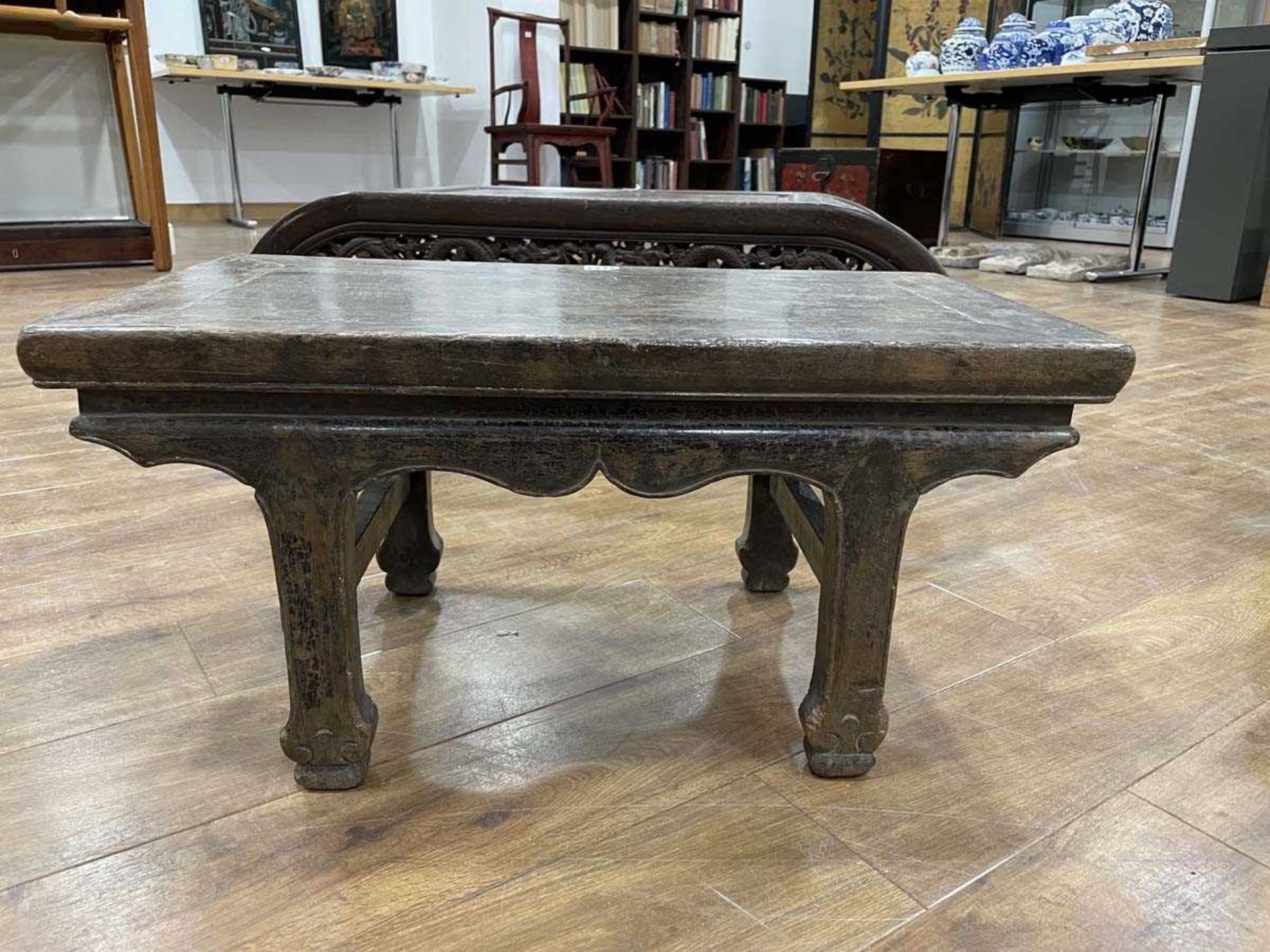 A Chinese low elm side table, the surface over a frieze on four shaped legs, 64 x 35 x 31 cm, - Bild 5 aus 15