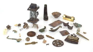 A mixed group of Oriental metalware including a tower, h. 9.5 cm, a wheelbarrow, a rickshaw, pins, a