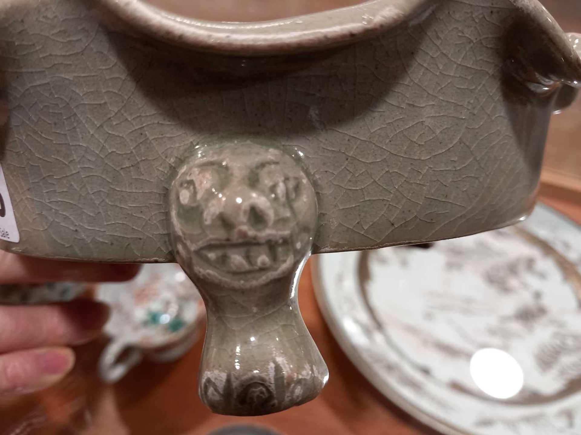 A Chinese celadon dish of scalloped circular form, relief decorated with exotic birds on three - Image 8 of 10