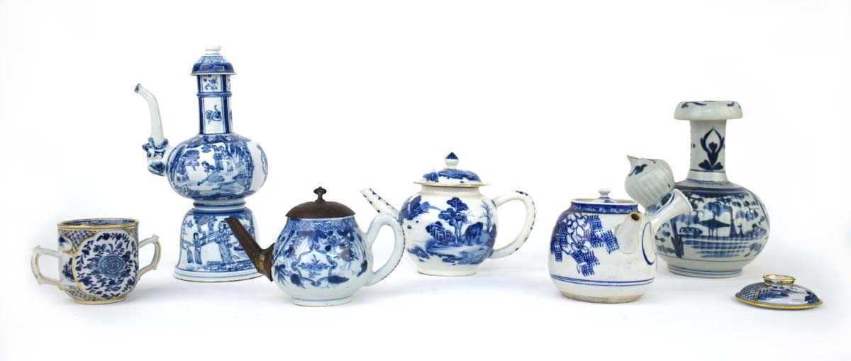 A Chinese blue and white teapot and cover, decorated with oxen in traditional landscapes, h. 12.5