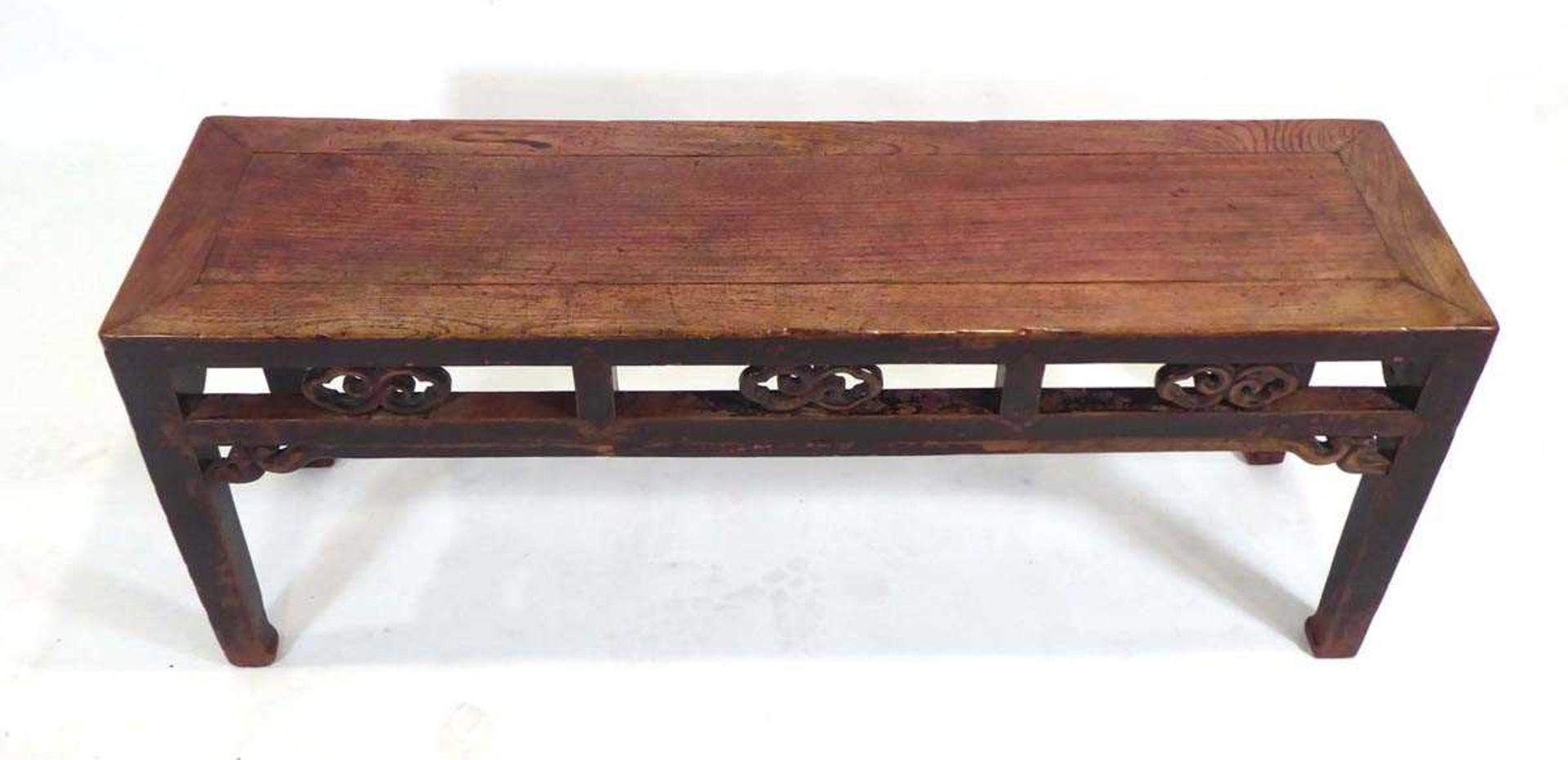 A Chinese hardwood bench of typical form, w. 120 cm, h. 48 cm, d. 32 cm *from the collection of - Image 2 of 3