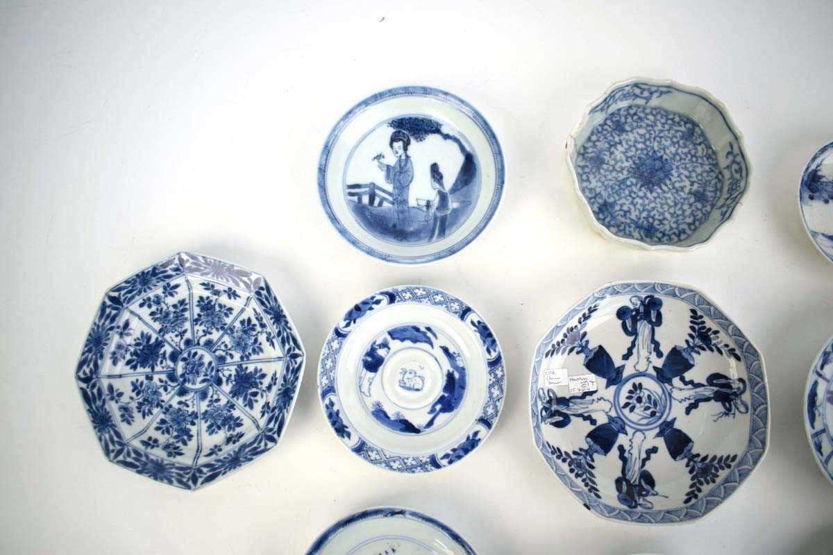 Eleven 18th century and later Chinese blue and white dishes and saucers including examples decorated - Image 2 of 8