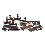 A group of Chinese carved hardwood stands and rests (12) *from the collection of Phillip Allen (
