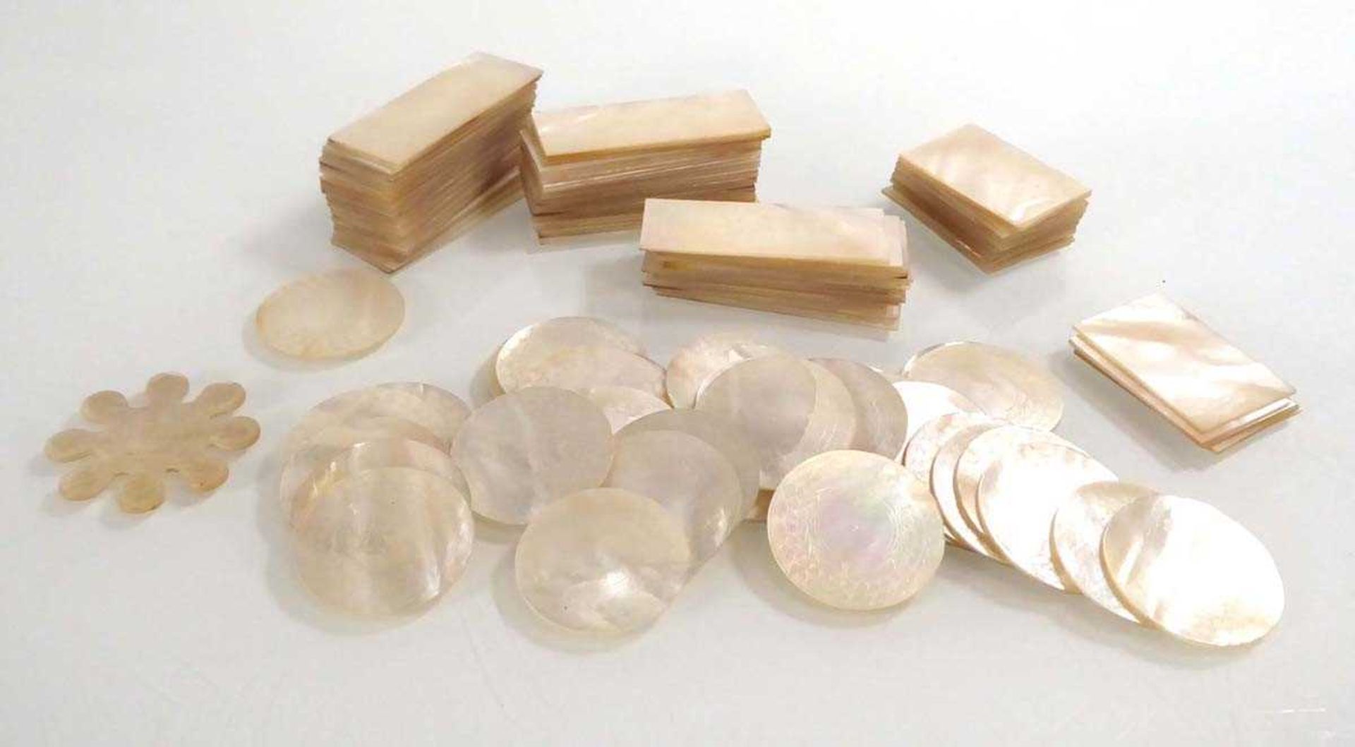 A group of Chinese mother of pearl gaming counters of rectangular and round form (approx. 100) *from