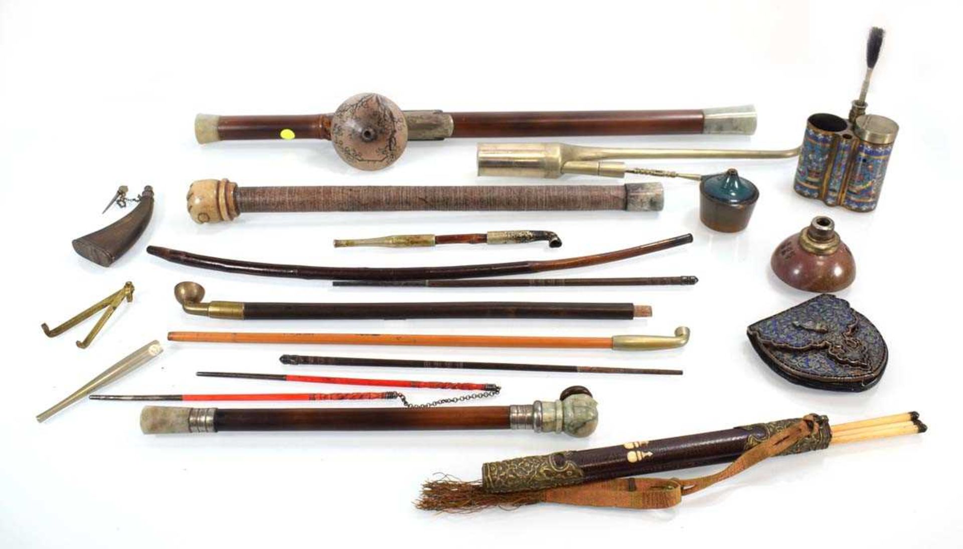 A Chinese bamboo opium pipe, l. 53 cm, together with a group of other smoking related items, a