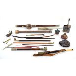 A Chinese bamboo opium pipe, l. 53 cm, together with a group of other smoking related items, a