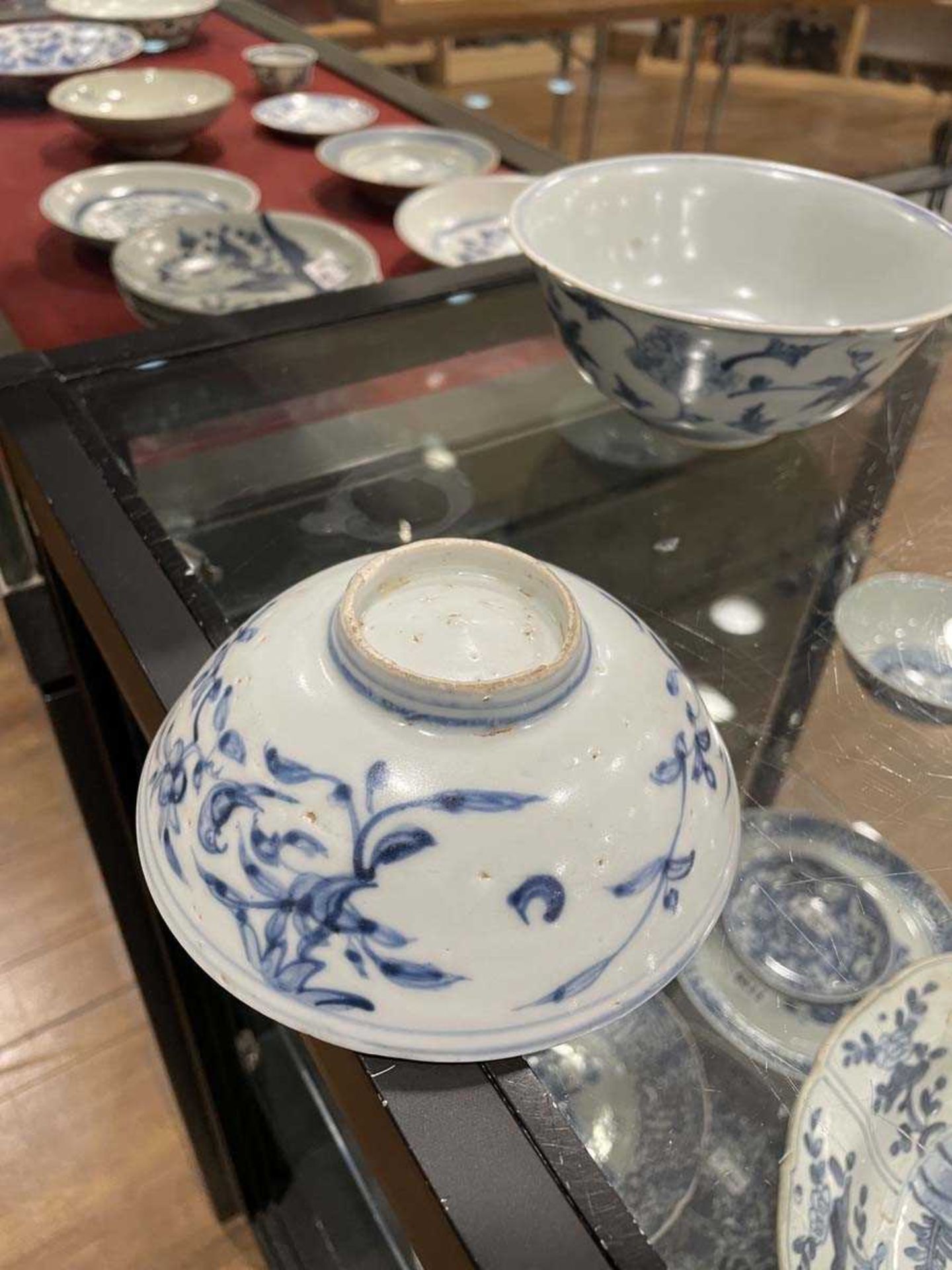 A Chinese blue and white bowl of flared form, externally decorated with scrolls of stylised - Image 22 of 22