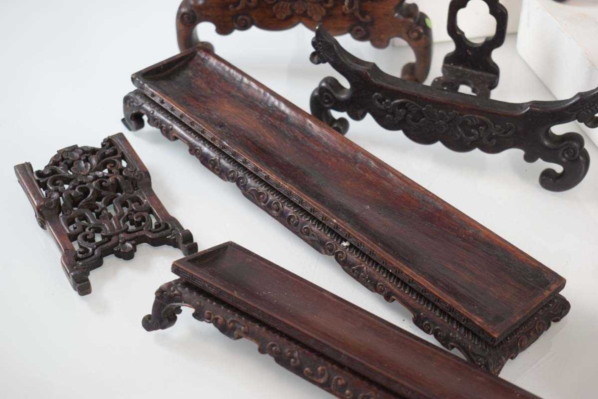 A group of Chinese carved hardwood stands and rests (12) *from the collection of Phillip Allen ( - Image 5 of 6