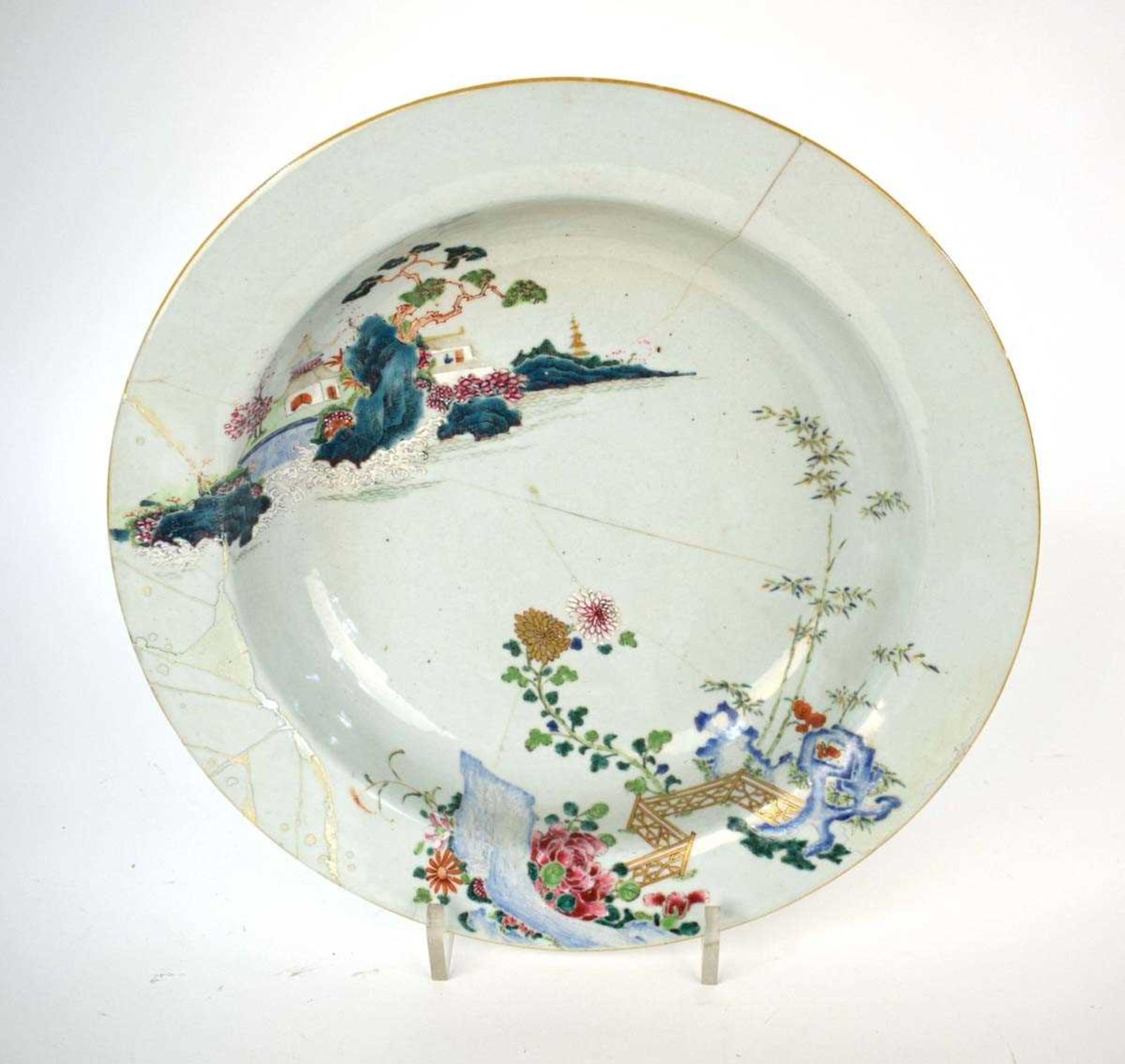 A Chinese charger decorated in coloured enamels with an extensive landscape within a foliate border, - Image 4 of 5