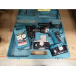 Makita battery drill with 2 batteries and charger