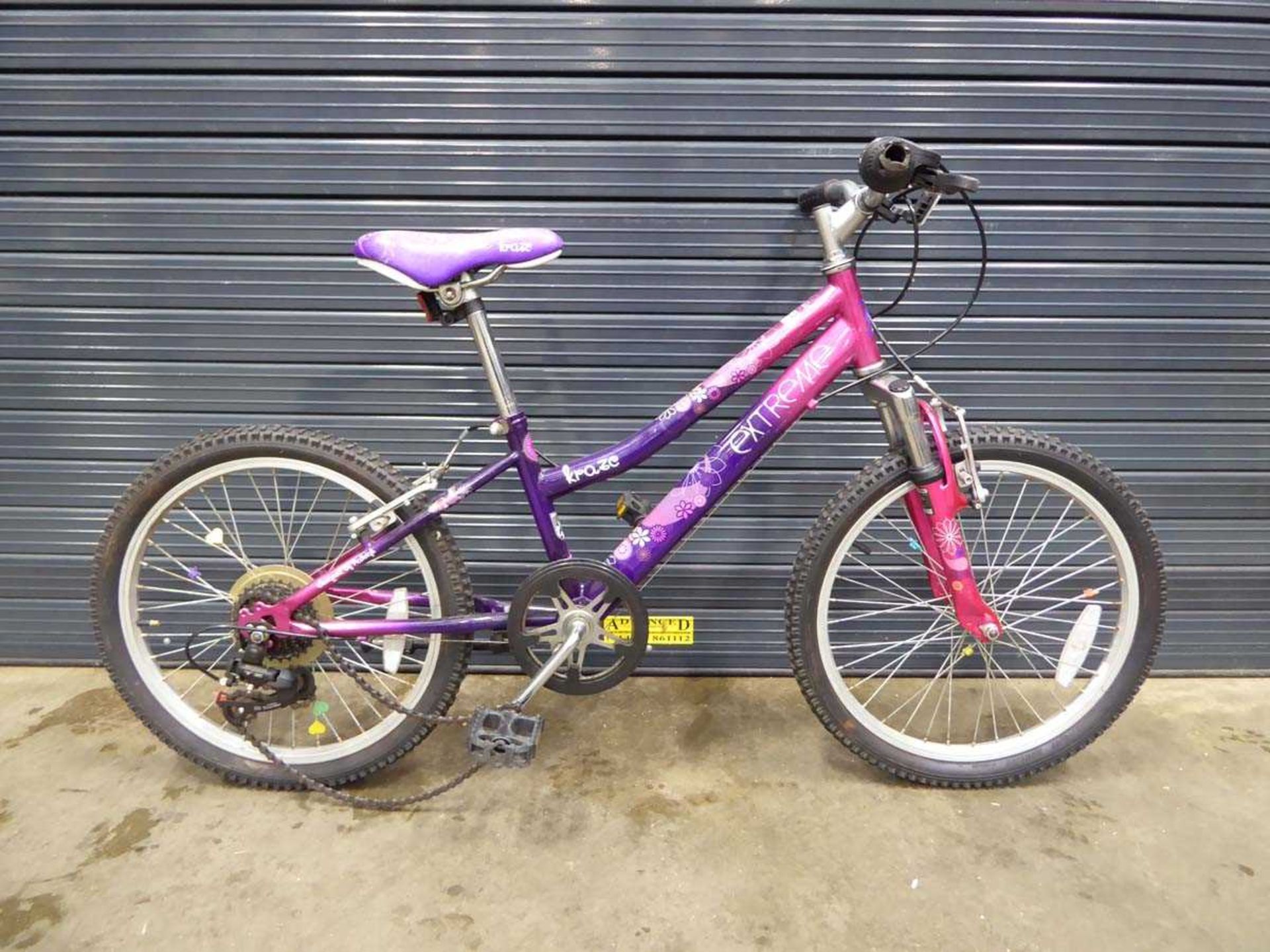 Pink and purple girls bike