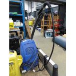 Small blue electric pressure washer with hose and lance