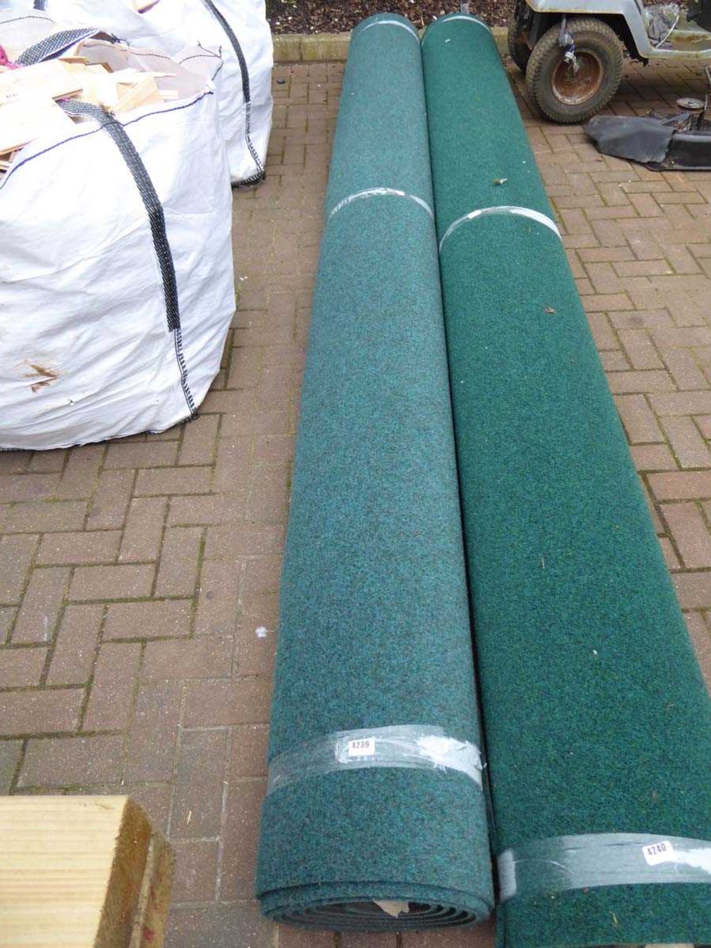 Roll of green commercial style carpet