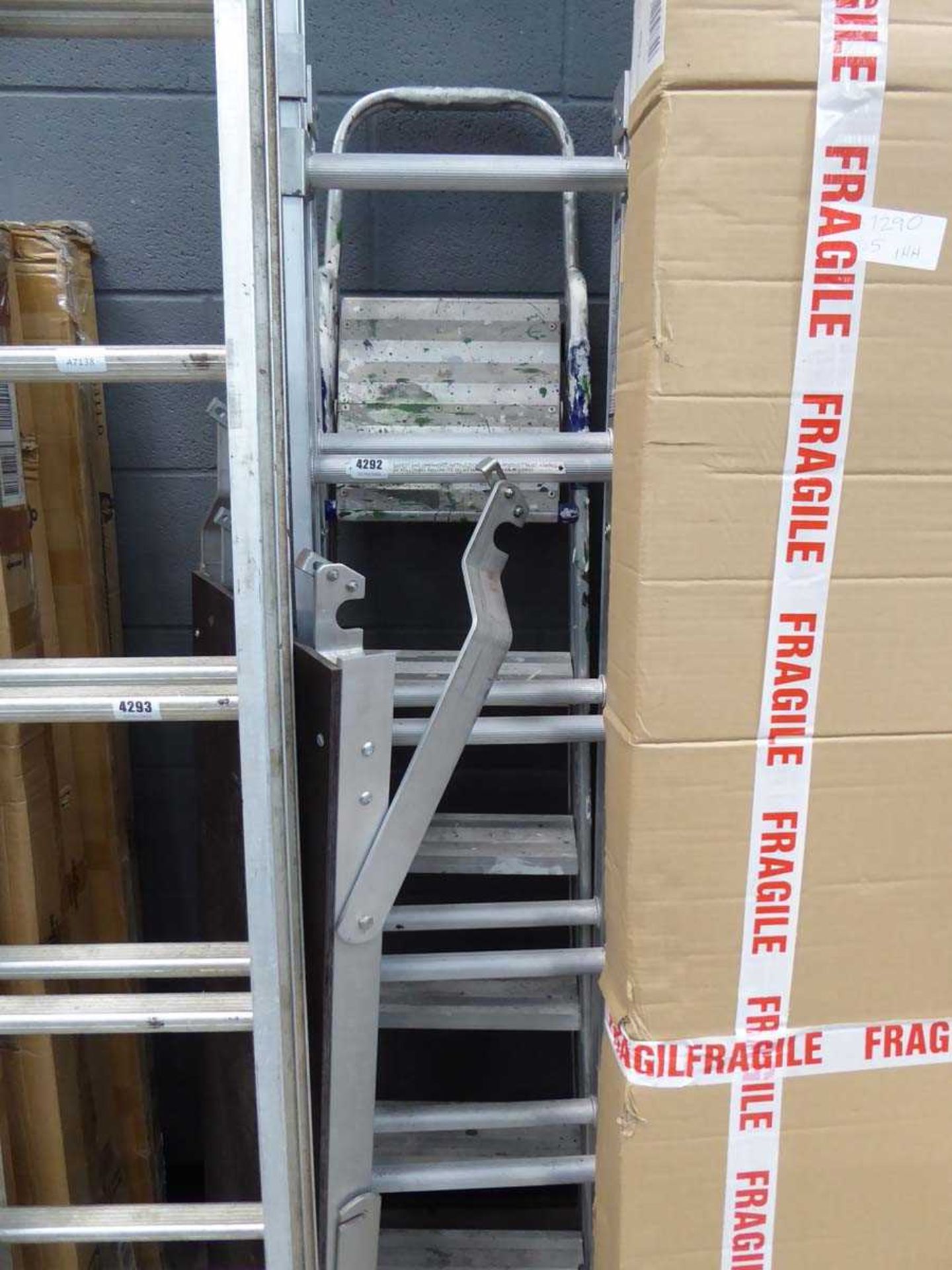Small multi purpose ladder with platform and stepladder