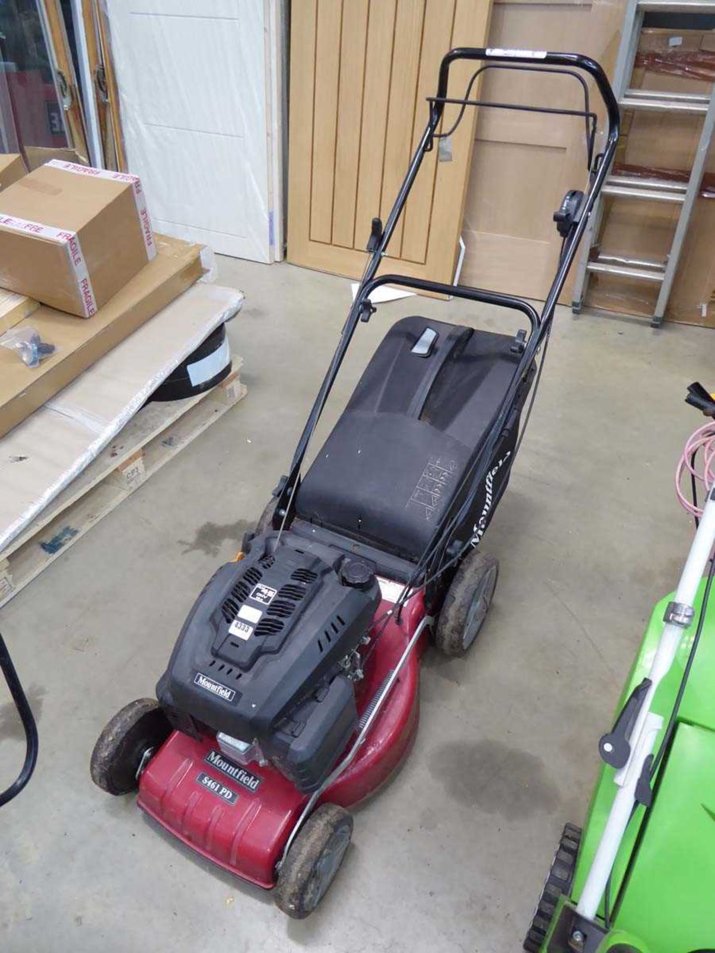 Mountfield red petrol powered rotary mower with grass box