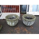 2 small round concrete pots