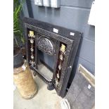 Cast iron and tiled fire surround