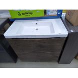 Wood effect vanity unit with sink above