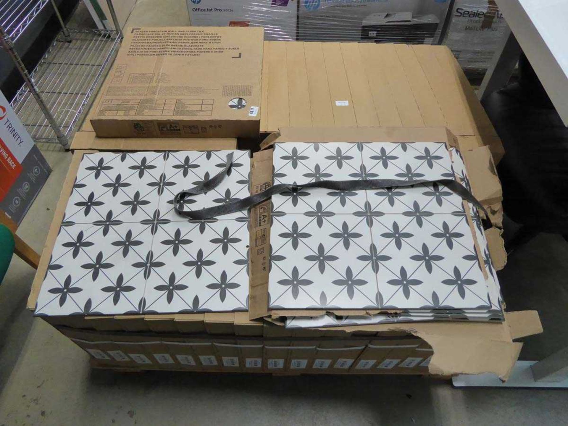 Pallet of white and black patterned tiles