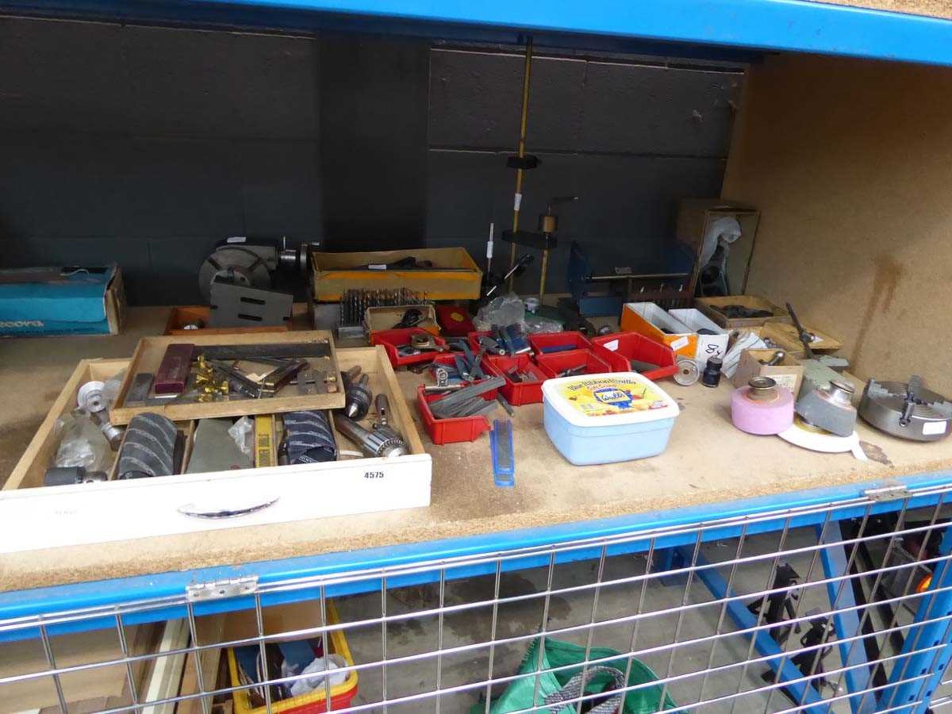 Half a cage of metal work lathe parts and accessories including tooling, chucks, 4-way chuck,