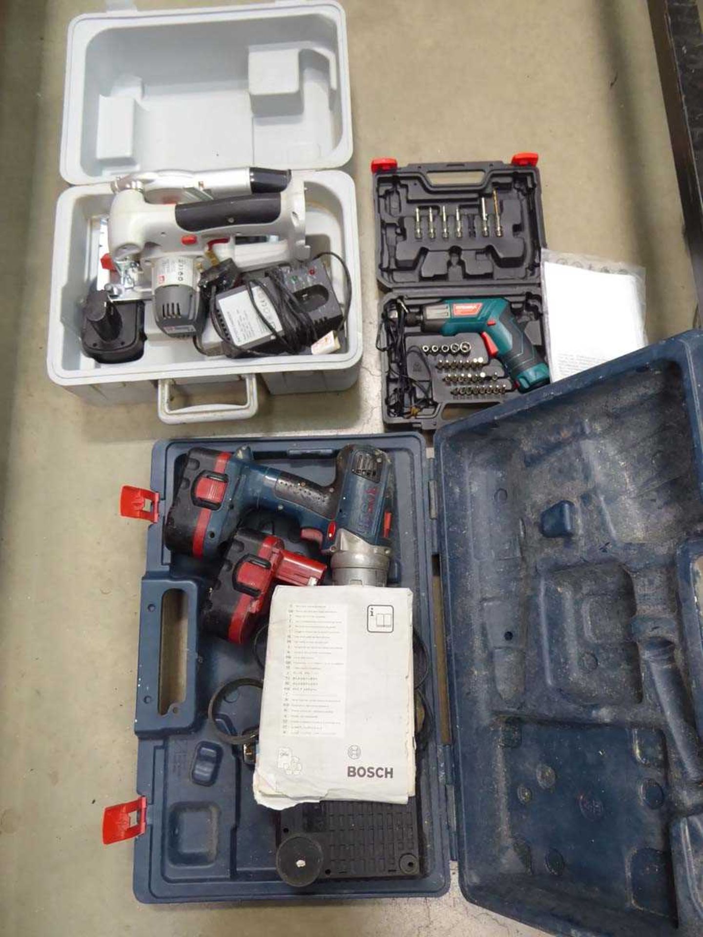 Circular saw, small mini screwdriver and a Bosch battery drill