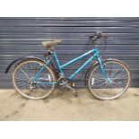 Turquoise girls mountain bike