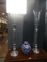Pair of chromed candle holders