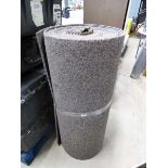 Small roll of heavy duty brown carpet