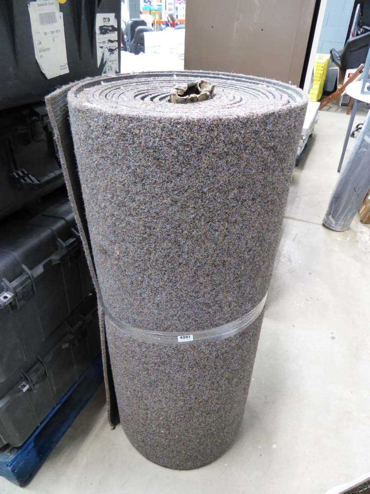 Small roll of heavy duty brown carpet