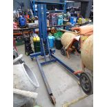 Folding garage floor engine crane