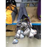 Assortment of golf clubs including Ping, Dunlop, etc
