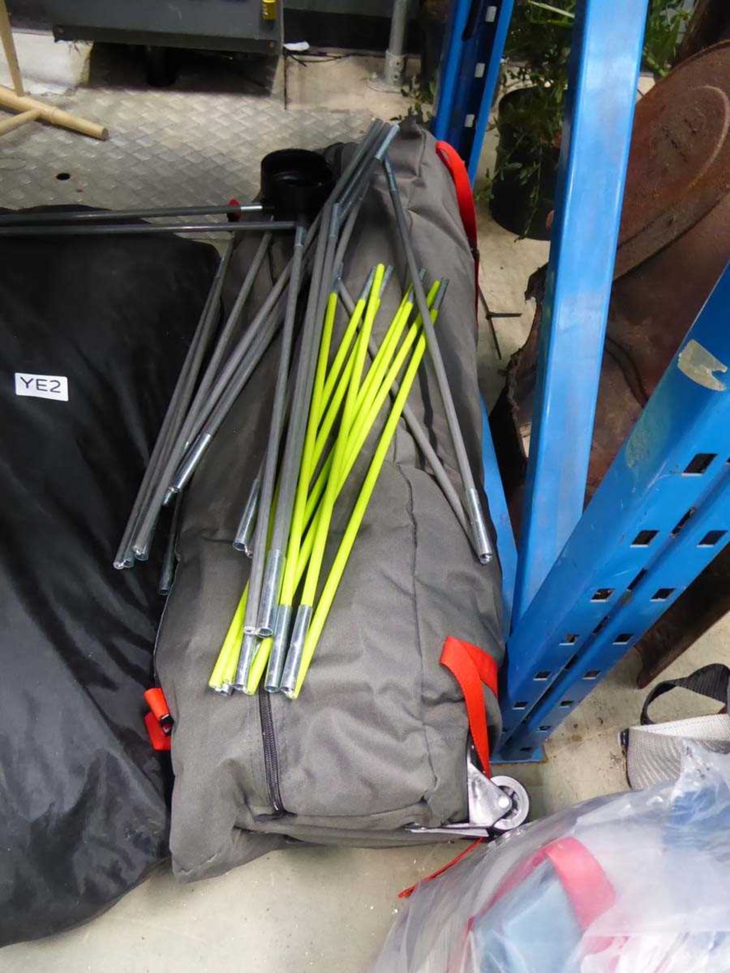 +VAT Bag containing various tent parts Not as shown on side of bag