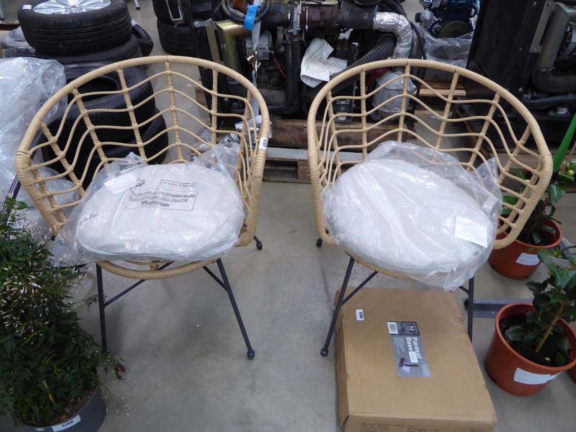 2 x rattan style garden chairs with cushions