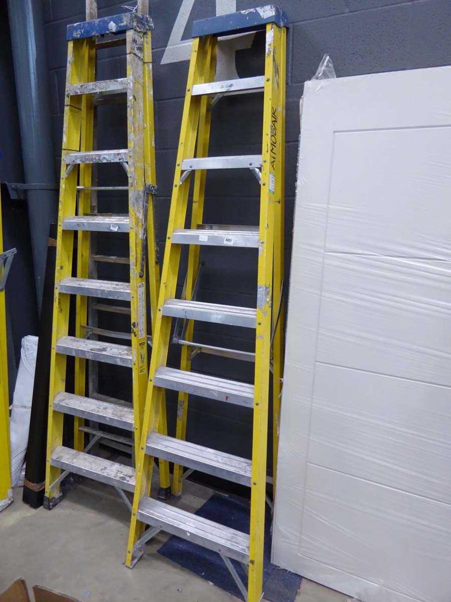 8 tread yellow and silver electricians style stepladder