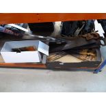 Box containing hand saws, steel measures and some small tools