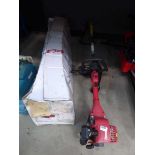 Mowerland petrol powered strimmer with attachments