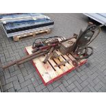 Pallet containing sand blasting pot, small acrow prop, body jack set, pickaxe etc.