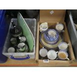 Two boxes containing blue and white and green glazed china