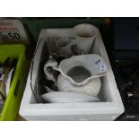 Box containing stainless steel tea service, jugs and serving trays