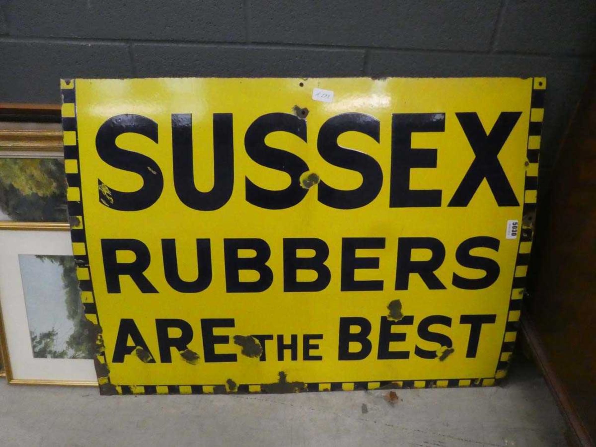 Enamelled Sussex Rubbers sign
