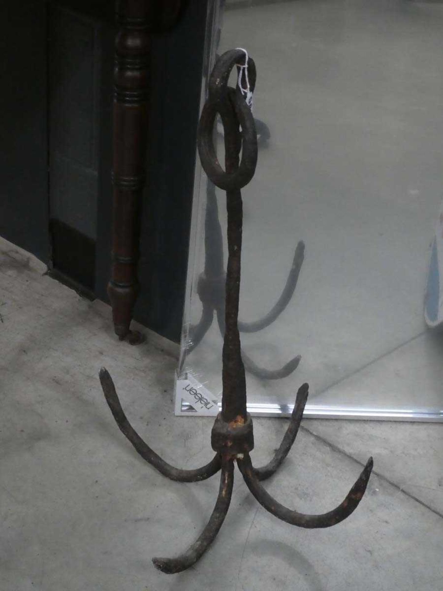 A 19th or 20th century cast iron grapnel anchor/grappling hook, h. 59 cm