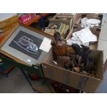 Two boxes containing three vintage car print, carved photo frame plus carved animal figures
