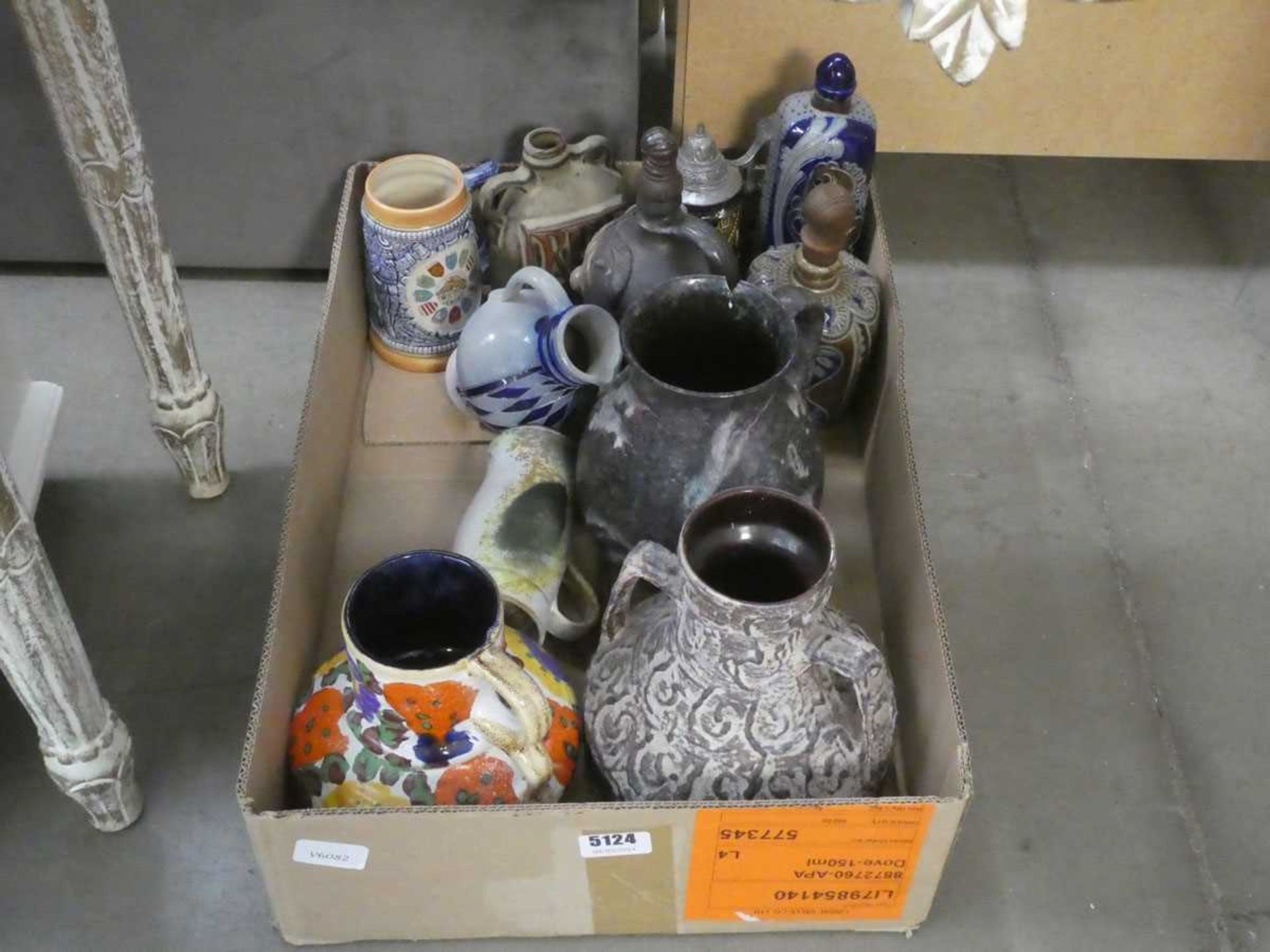 Box containing beer-steins, stoneware and various pots