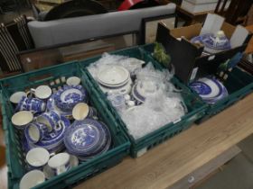 4 boxes containing blue and white crockery