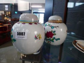 Two rose patterned ginger jars