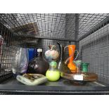 Cage containing glass jugs, ashtrays, vases and bowls